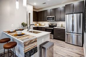 Bozeman apartment for rent - Kitchen and dining at Icon Apartment Homes at Ferguson Farm, Montana, 59718
