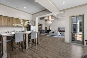 Austin apartment for rent - A kitchen with a dining table and chairs.