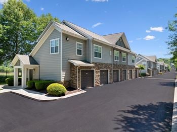 Carriage style apartment homes with attached garage available