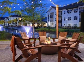 Outdoor relaxation area with fire pits , grills, & seating