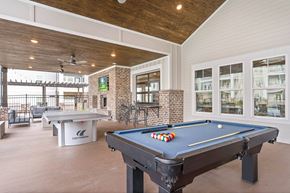 Alcoa apartment for rent - a covered patio with a pool table and a bar