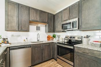 Shaker style maple cabinetry throughout
