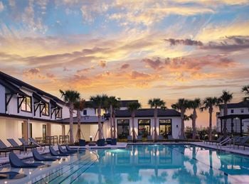 Resort inspired swimming pool overlooking the lake