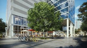 Honolulu condo for rent - a rendering of a building with bikes parked outside of it