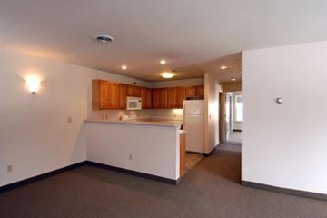 South Burlington apartment for rent - a kitchen and a living room with white walls