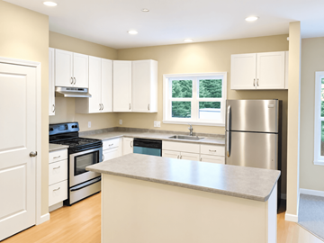 South Burlington apartment for rent - A kitchen with white cabinets and stainless steel appliances.