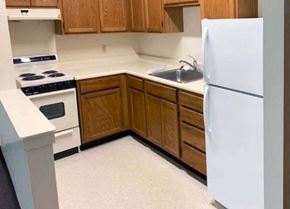 South Burlington apartment for rent - Country Park kitchen with refrigerator, stove and upper and lower storage cabinets