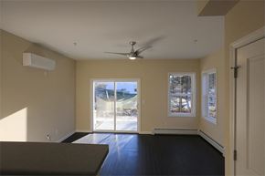 South Burlington apartment for rent - Rye Living room with wood floors and sliding doors to patio