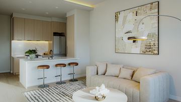 Los Angeles apartment for rent - A modern living room with a bar and a large abstract painting on the wall.