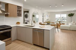 Los Angeles apartment for rent - A modern kitchen with a large island and a view of the city.
