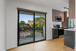 Los Angeles apartment for rent - a kitchen with a sliding glass door leading to a balcony
