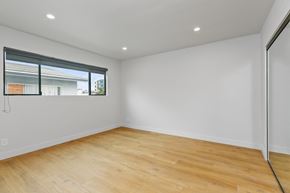 Los Angeles apartment for rent - a living room with white walls and wood floors and a window