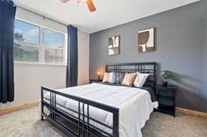 Wichita apartment for rent - an empty bedroom with a bed and a window