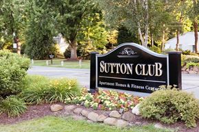 Kentwood apartment for rent - A sign for Sutton Club Apartment Homes & Fitness Center.