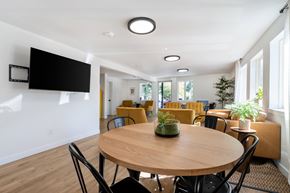Centralia apartment for rent - A conference room with a round table and chairs.
