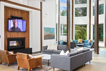 Lynnwood apartment for rent - A living room with a fireplace and a television on the wall.