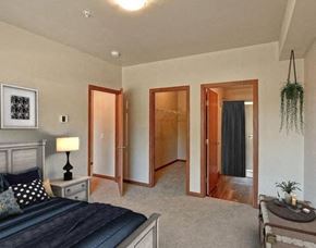 Wenatchee apartment for rent - a bedroom with a bed and a closet