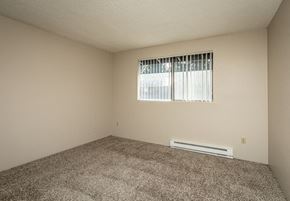 Lynnwood apartment for rent - an empty room with carpet and a window
