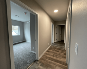 Marysville apartment for rent - a hallway with a door to a bedroom and a window