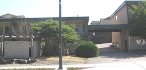 Seattle apartment for rent - a building with an overpass and a sidewalk