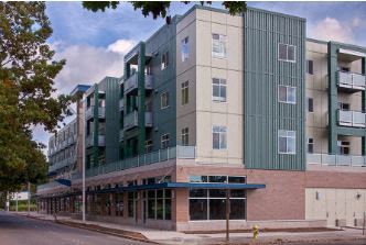 Renton apartment for rent - a large building with a street in front of it