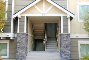Wenatchee apartment for rent - the front of a house with stairs and a door