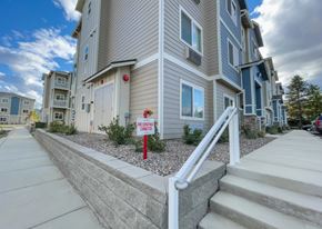 Wenatchee apartment for rent - A building with a "Preferred Tenant" sign in front of it.