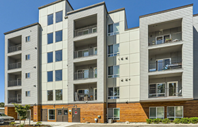 Everett apartment for rent - A modern apartment building with balconies and multiple windows.