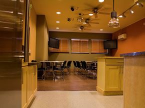 Seattle apartment for rent - a room with a table and chairs and a refrigerator