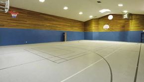 Bothell apartment for rent - a basketball court in a gym with a basketball hoop