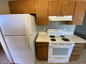 Marysville apartment for rent - a kitchen with white appliances and a refrigerator