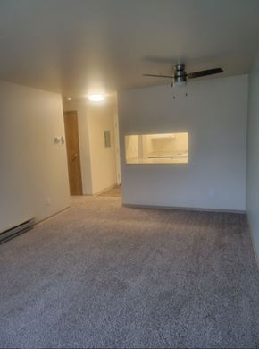Lake Stevens apartment for rent - a empty living room with a ceiling fan in it