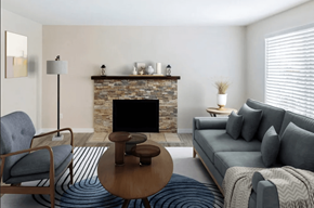 Lake Oswego apartment for rent - A living room with a grey couch, a wooden coffee table, and a fireplace.