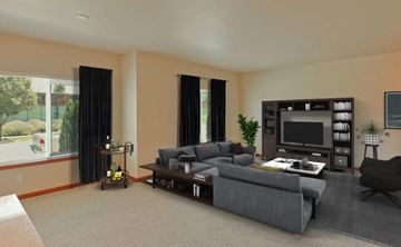 Wenatchee apartment for rent - A living room with a grey couch and a television.