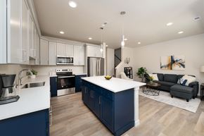 Marysville apartment for rent - A modern kitchen with a large island in the middle.