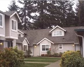 Lynnwood apartment for rent - a row of houses on a street with trees