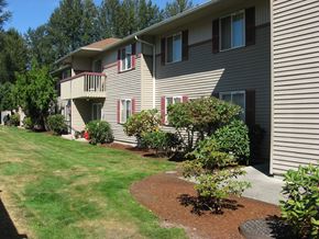Lake Stevens apartment for rent - a view of a house with a yard in front of it
