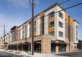 Seattle apartment for rent - a building that is on the side of a street