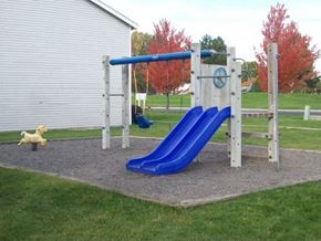 Connell apartment for rent - a playground with two slides and a swing set