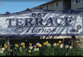 East Wenatchee apartment for rent - a sign that says terrace olamo in front of a house