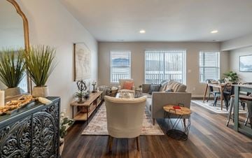 East Wenatchee apartment for rent - A living room with a large sofa and a wooden coffee table.