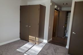 Marysville apartment for rent - a row of closet doors in a room