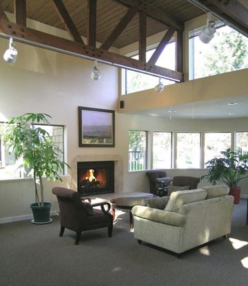 Federal Way apartment for rent - a living room with couches and chairs and a fireplace