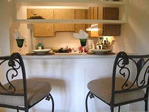 Federal Way apartment for rent - a kitchen with two chairs and a counter
