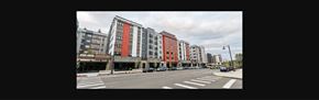 Mountlake Terrace apartment for rent - a view of a city street with tall buildings