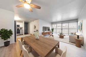 Seattle apartment for rent - A modern dining room with a wooden table and chairs.