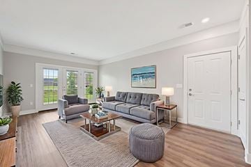 Lewis Center apartment for rent - A living room with a grey couch and a coffee table.