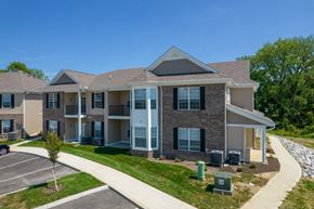 Lancaster townhouse for rent - an apartment building with a sidewalk in front of it