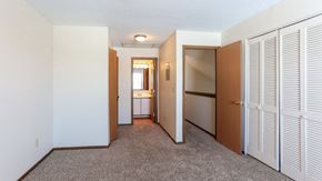 Marion apartment for rent - a bedroom with a door to a closet and a bathroom