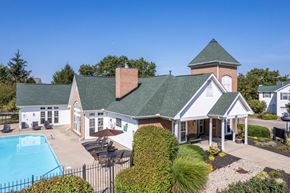 Beavercreek apartment for rent - a view of a house with a pool and a building
